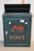 A metal box marked Post