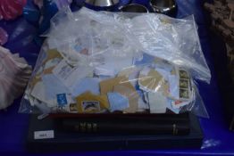 Three albums of world stamps plus various loose