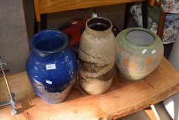 Group of three mid-century pottery vases