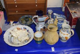 Ceramics to include a crudely repaired Moorcroft vase, various figures, jugs etc