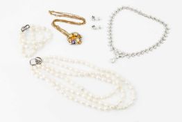 A silver-gilt and paste set cluster pendant by Arté, on silver-gilt fancy-link chain, a silver and