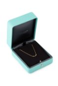 An 18ct gold and diamond T-Smile necklace by Tiffany & Co, set with sixteen brilliant-cut