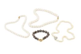 A single strand uniform cultured pearl necklace, with 18ct gold clasp, stamped 750, 43.5cm long,