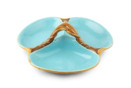 A 19th century Minton majolica serving dish, of three section form, having naturalistic central