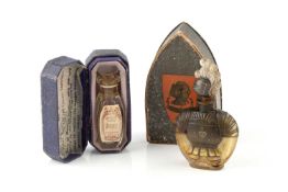 A 1920's vintage Ciro 'Le Chevalier de Nuit' perfume bottle, 8.5cm high, in original arched box, and
