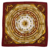 An 'Astrologie Forever' silk scarf by Hermès, designed by Françoise Faconnet, decorated in shades of