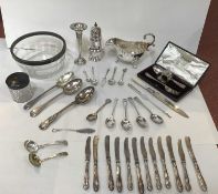 A 19th century silver plated table centrepiece, with basket top, and foliate cast spreading column