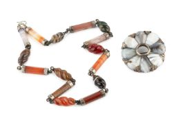 A Scottish hardstone necklace, composed of alternating octagonal baton and spirally carved oval