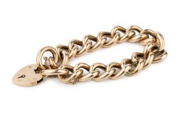 A 9ct gold curb link bracelet, with padlock clasp and safety chain, stamped 9ct Approx 28.7g