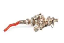 A Victorian silver baby's rattle and whistle, embossed with scrolling foliage and hung with four (of