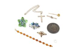 A 9ct gold mounted amber bracelet, composed of eleven cabochon links, stamped 375, 17.5cm long, a