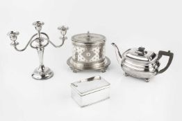 A late Victorian silver plated oval biscuit box, with engraved decoration, 17cm high, together