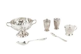 An Edwardian silver twin handled pedestal bowl, with embossed Arts & Crafts style decoration, and