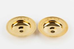 A pair of silver-gilt small Armada dishes, by William Comyns & Sons Ltd, London 1971, 9.5cm wide,