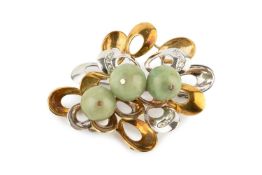 An 18ct two-colour gold, jade and diamond brooch, formed as an abstract cluster of oval stylised