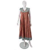 Two iconic Anna Belinda of Oxford dresses. One featuring long sleeves, frontal button fastening,