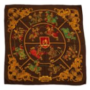 A ‘Chevalerie’ silk scarf by Hermès, designed by Cathy Latham, depicting jousting knights and two