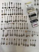 A small collection of silver souvenir spoons, together with a large collection of silver plated