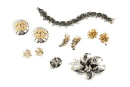 A Christian Dior bracelet by Mitchel Maer, composed of heart shaped grey paste stones and white