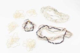 A four-colour multi-strand freshwater pearl necklace, and matching bracelet by Coleman Douglas