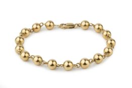 A French 18ct gold bracelet, composed of ball links, the clasp stamped 750, 19.5cm long approx 9g