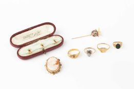 A diamond and gem set stick pin, in the form of a pennant with eagle surmount, a 9ct gold mounted