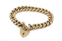 A 9ct gold curb link bracelet, with alternating reeded and plain links, and engraved padlock clasp