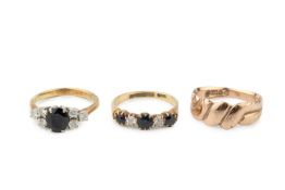 A sapphire and diamond five stone ring, the three round cut sapphires and two brilliant cut diamonds