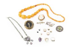 A collection of jewellery, comprising an opal dress ring, in 9ct gold mount, an amethyst and diamond