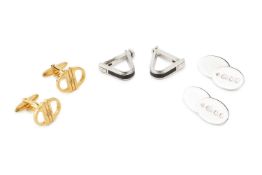 Two pairs of silver cufflinks by Dunhill, the first of rounded triangular form with black enamel