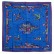 A 'La Mare aux Canards' silk scarf by Hermès, designed by Daphne Duchesne, in shades of rich blue