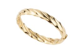 A 9k gold oval hinged bangle, of wrythen form, the clasp stamped 9kt, 7cm wide Approx 20.9g