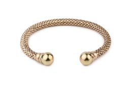 An Italian 9ct gold torc bangle, of hollow mesh form with ball terminals, 7cm wide Condition appears