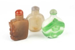 A Chinese hardstone snuff bottle, of rectangular form, one side relief carved with a butterfly and