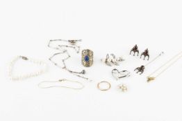 A collection of jewellery, comprising a blue stone set pendant, on 18k gold trace link chain, a pair