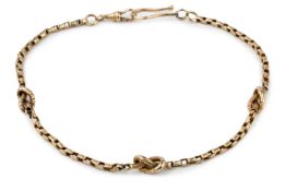A late 19th century yellow precious metal Albert chain, the engraved box links interspersed with a