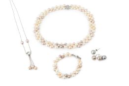 A silver mounted freshwater pearl triple pendant on chain, a three colour freshwater pearl collar