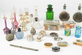 A collection of various scent bottles, to include coloured glass and gilt decorated examples, and