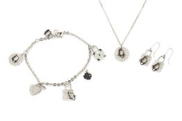 A paste set charm bracelet by Christian Dior, with heart, padlock and Dior charms, together with a