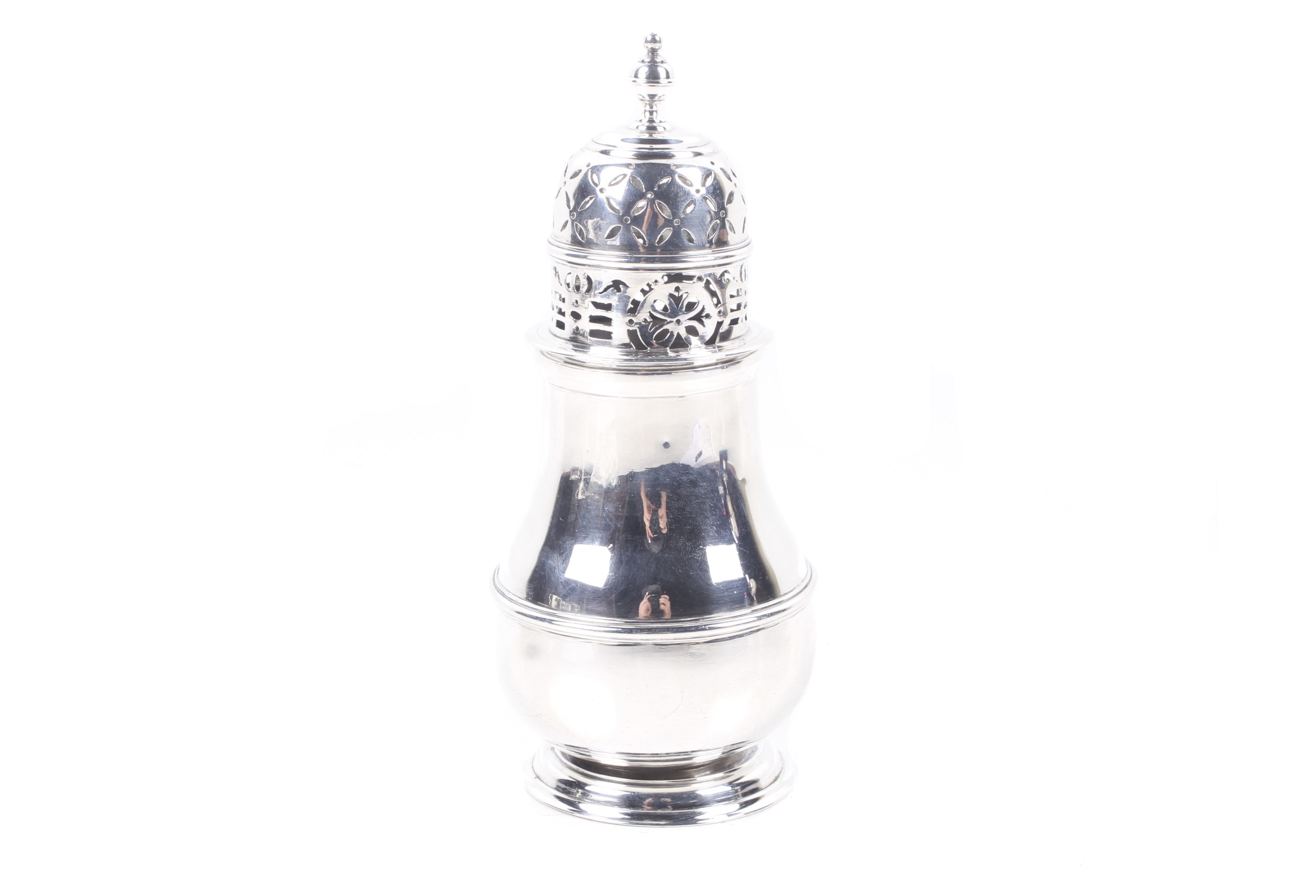 A late Victorian silver baluster-shaped sugar caster in George II style.
