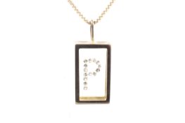 A Continental diamond initial 'P' pendant and chain.