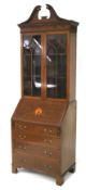 A Sheraton Revival Edwardian mahogany bureau bookcase.