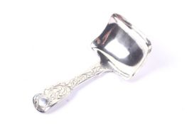 An early Victorian silver fiddle pattern cady spoon.