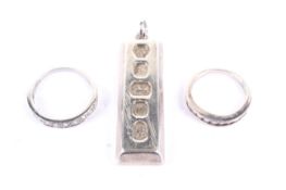 An 18ct white gold and diamond half-eternity ring and other items.