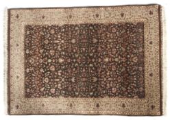 A brown ground rug with cream decoration.