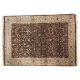 A brown ground rug with cream decoration. - Image 1 of 3