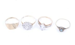 Four various vintage 9ct gold rings.