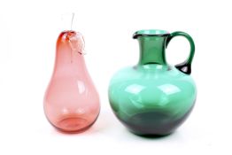 William Yeoward Aurora glass pear bottle with stopper and a green jug.