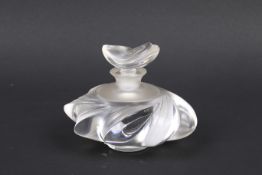 A Lalique Samoa France perfume bottle 'ocean wave and shell' design.