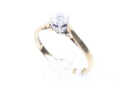 A vintage 18ct gold and diamond solitaire ring.